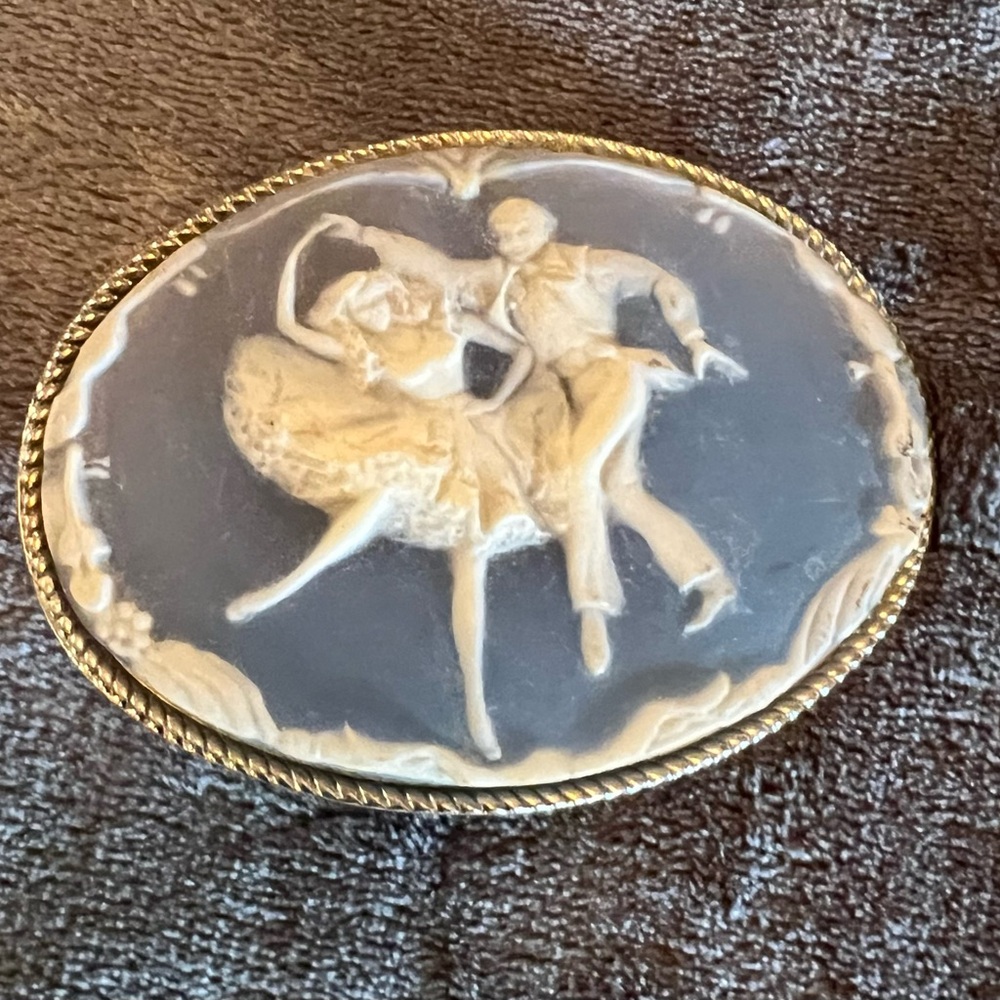 Dancers belt buckle. Genuine Incolay Stone. Light blue cameo.